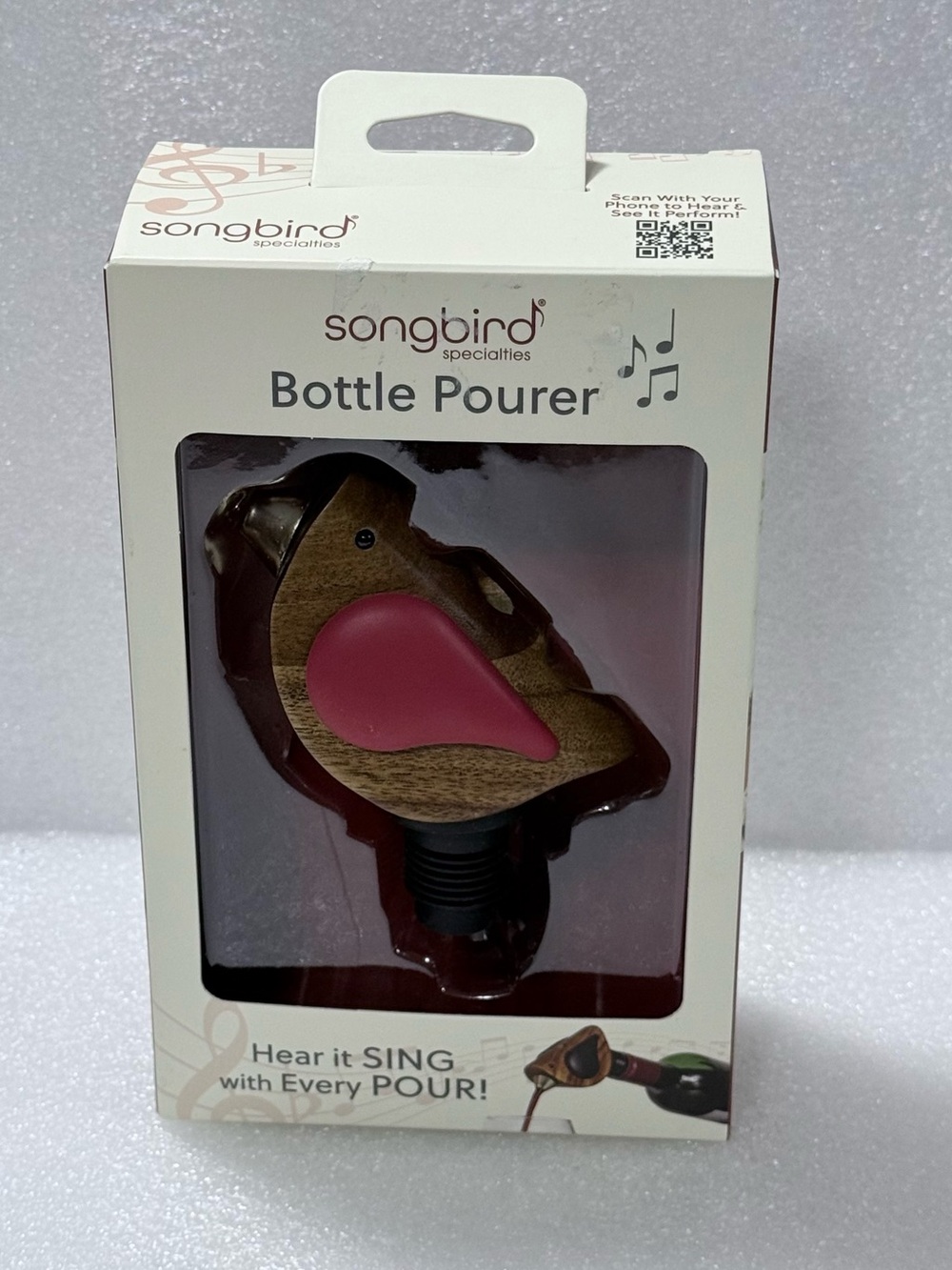 The Songbird Specialties red-winged bird-shaped bottle pourer